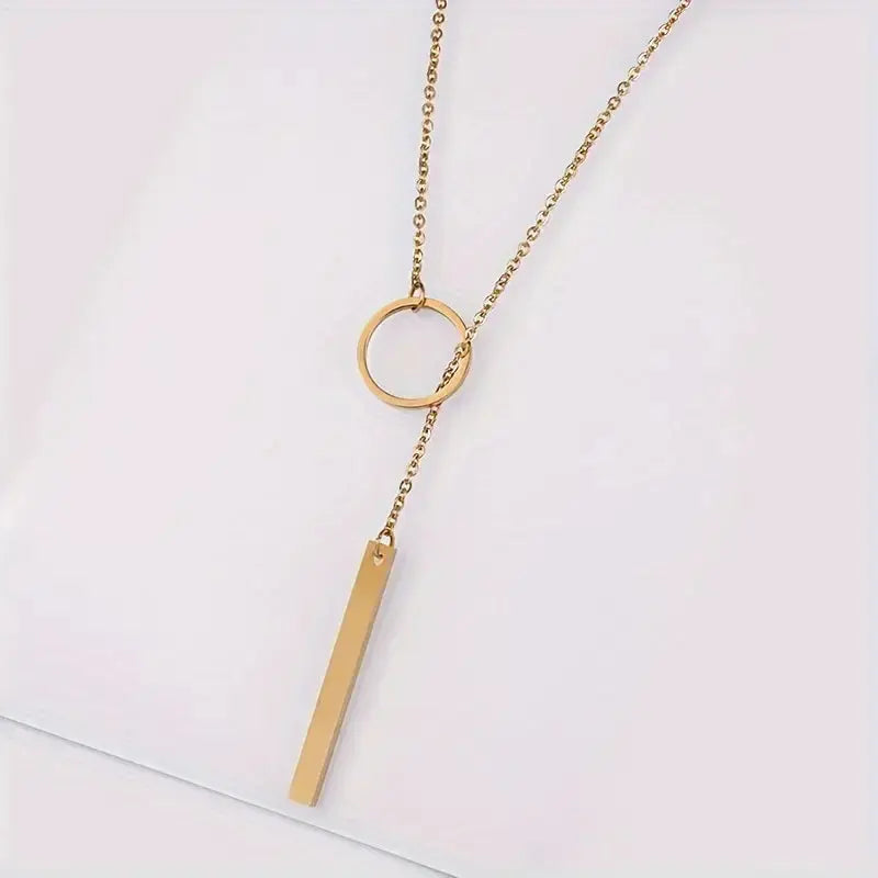 Ethnically inspired alloy circle and stick pendant necklace