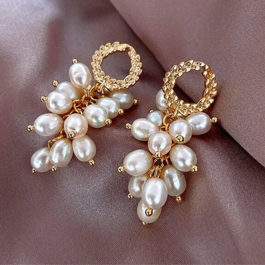 Luxury earrings with gold-linked pearls Unique Joyas