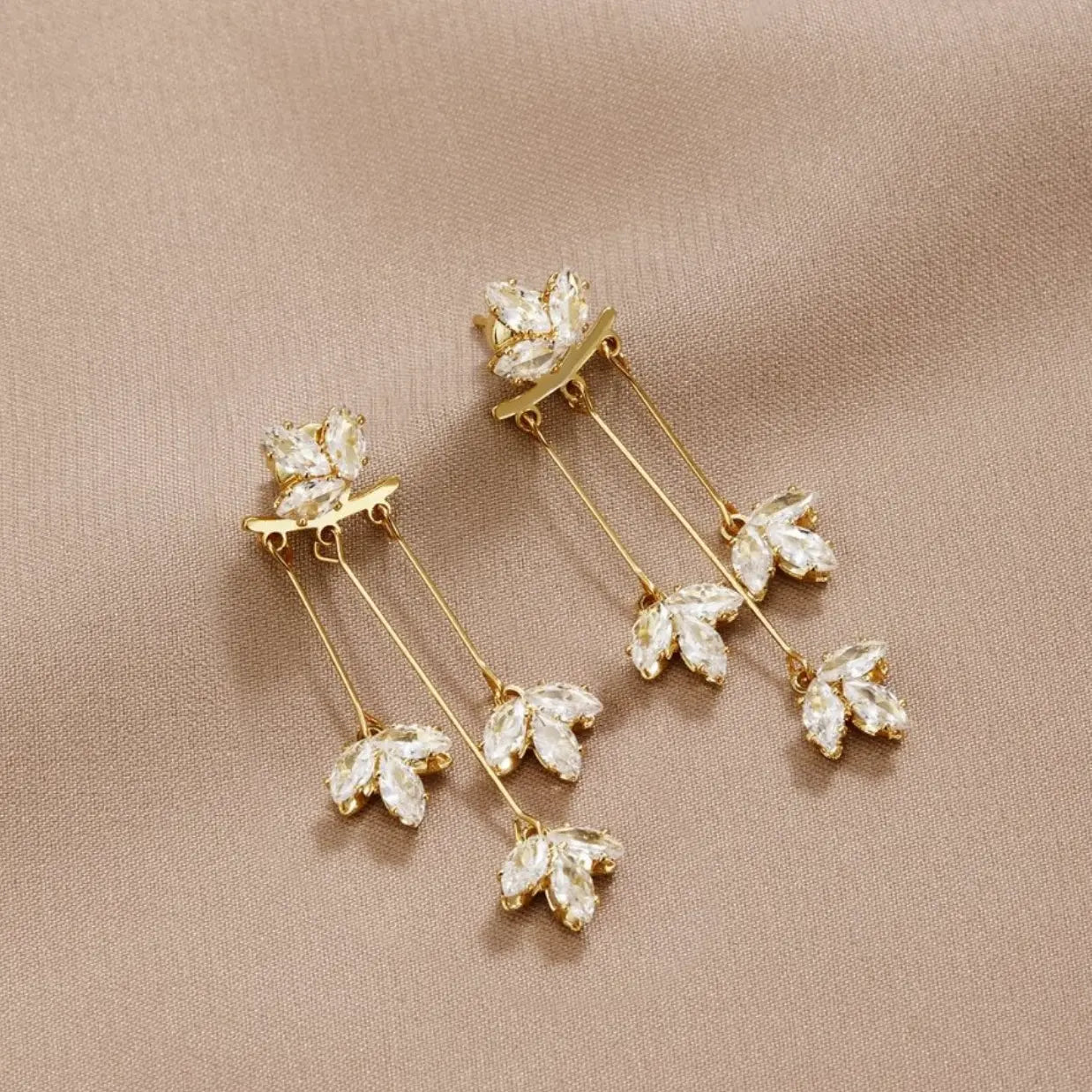 Crystal Leaf Earrings in Gold Unique Joyas