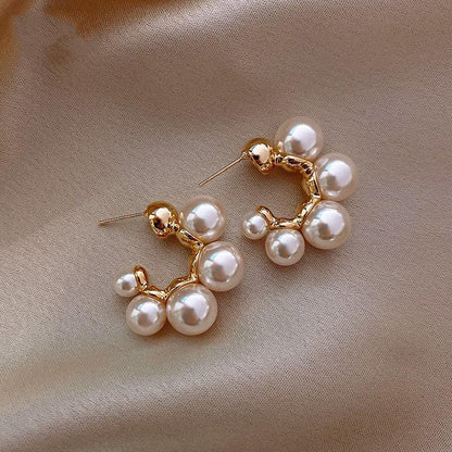 Elegant pearl earrings Unique Joyas