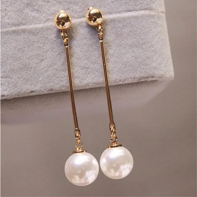 Luxurious dangling earrings with special hand-placed pearls Unique Joyas