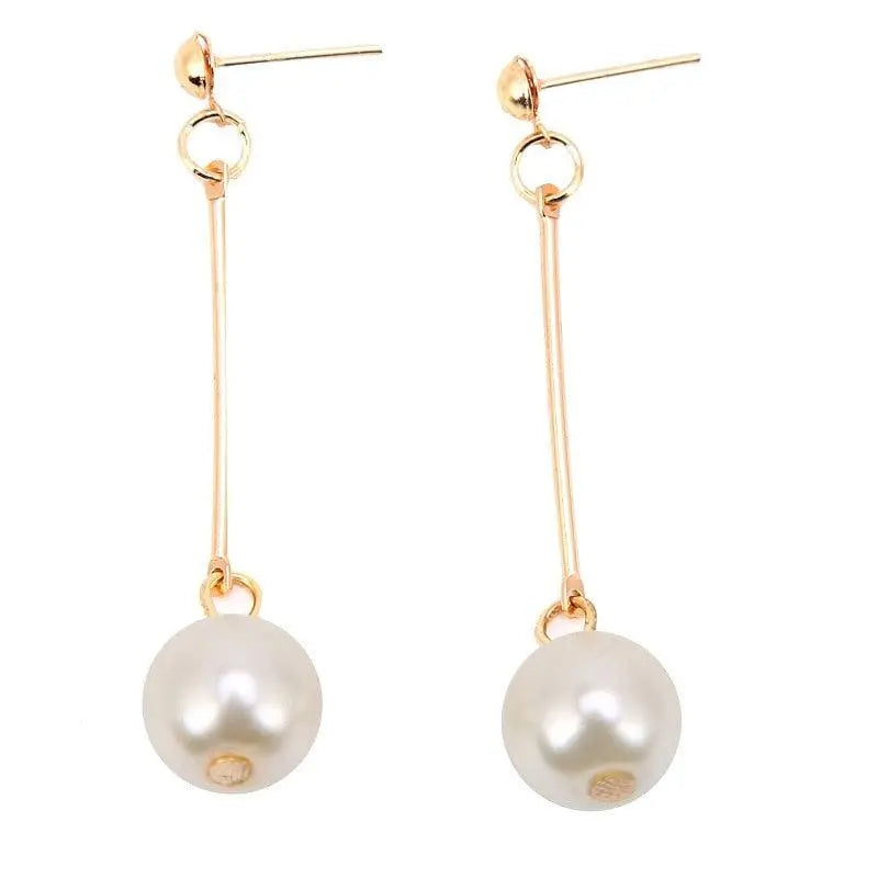 Luxurious dangling earrings with special hand-placed pearls Unique Joyas