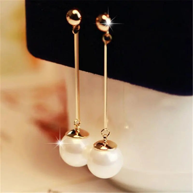 Luxurious dangling earrings with special hand-placed pearls Unique Joyas