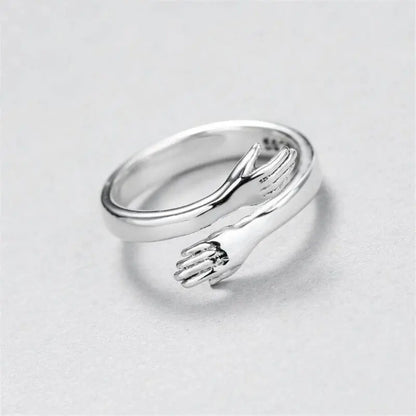 Silver adjustable hug ring