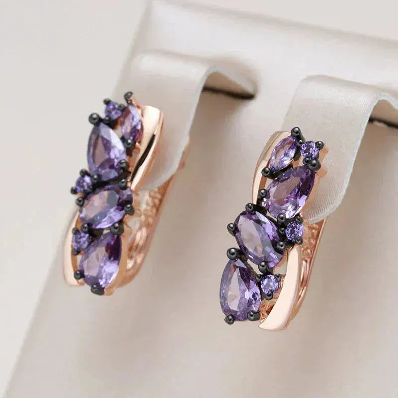 Elegant earrings with small purple crystal in gold Unique Joyas