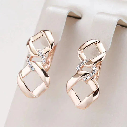 Elegant Knotted Earrings with Zirconia in Gold Unique Joyas