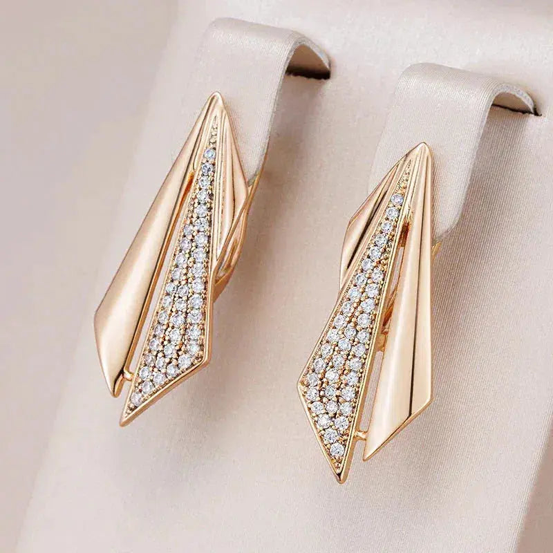 Elegant zirconium earrings in gold Unique Joyas