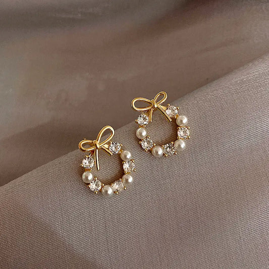 Chic Bow Hoop Earrings with Pearl Details Unique Joyas