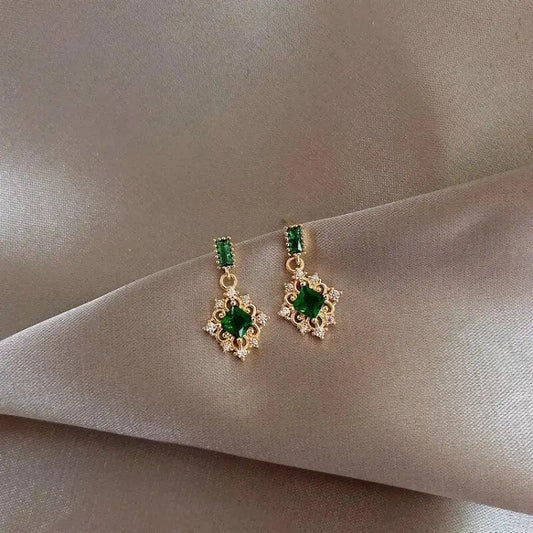 Elegant earrings with green crystals