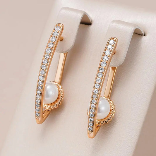 Elegant earrings with rhinestones and pearls