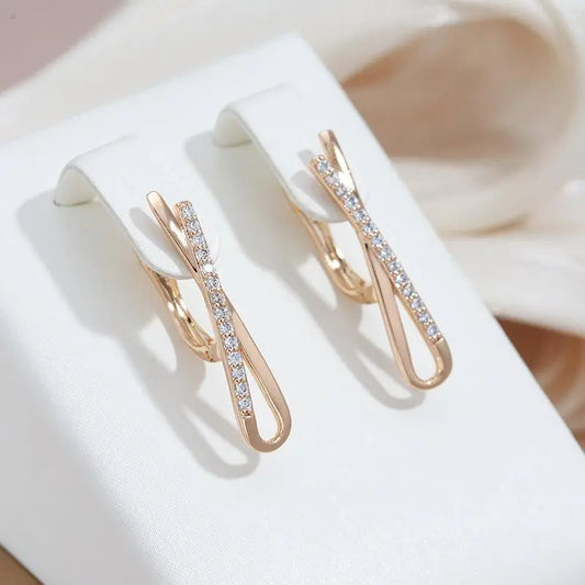 Crossed Diamond Earrings in Gold