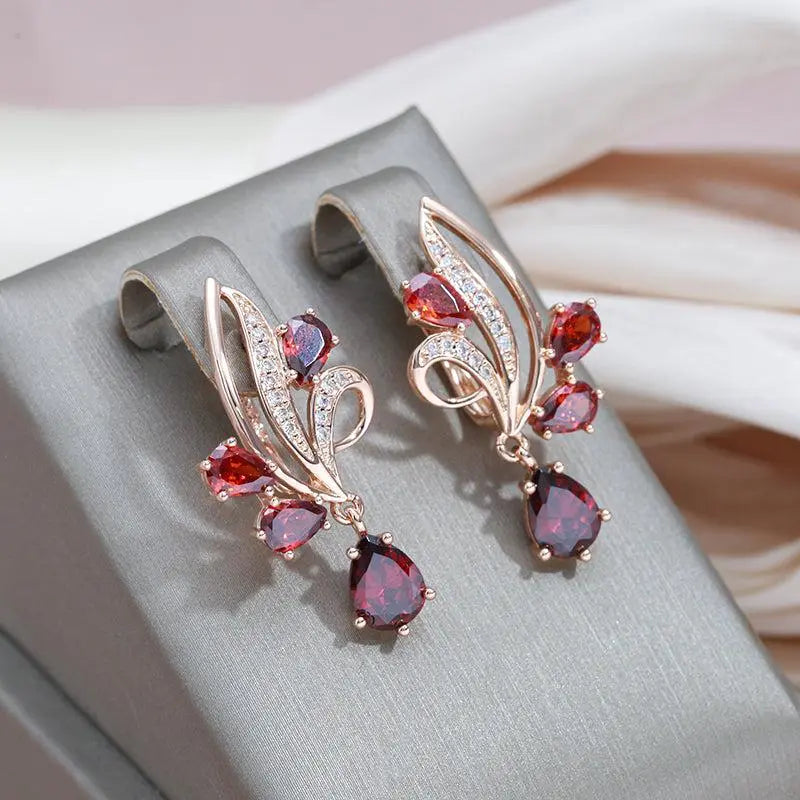 Elegant earrings with red crystals in gold Unique Joyas