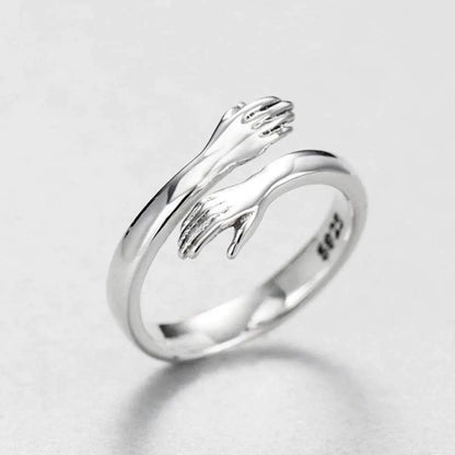 Silver adjustable hug ring