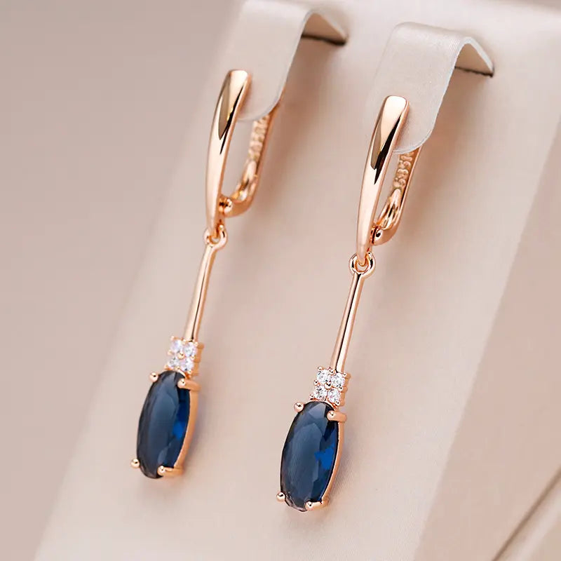 Elegant Blue Crystal Earrings in Gold Unique Joyas