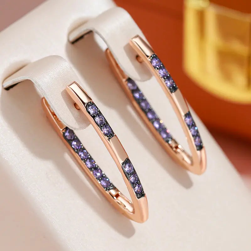 Elegant Gold Earrings with Purple Cubic Zirconia Unique Joyas