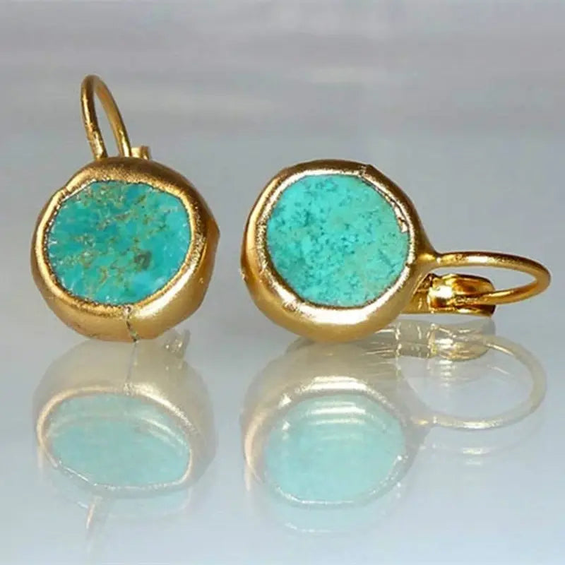 Gold earrings with turquoise stone