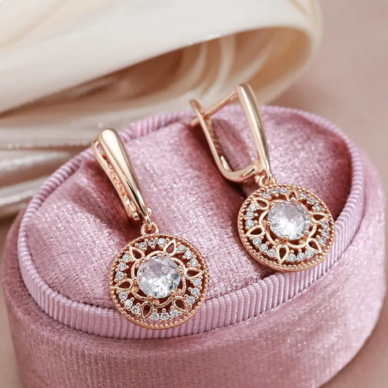 Elegant gold earrings with crystal loops Unique Joyas