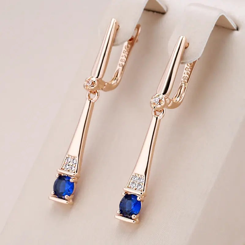 Blue Crystal Pendant Earrings in Gold