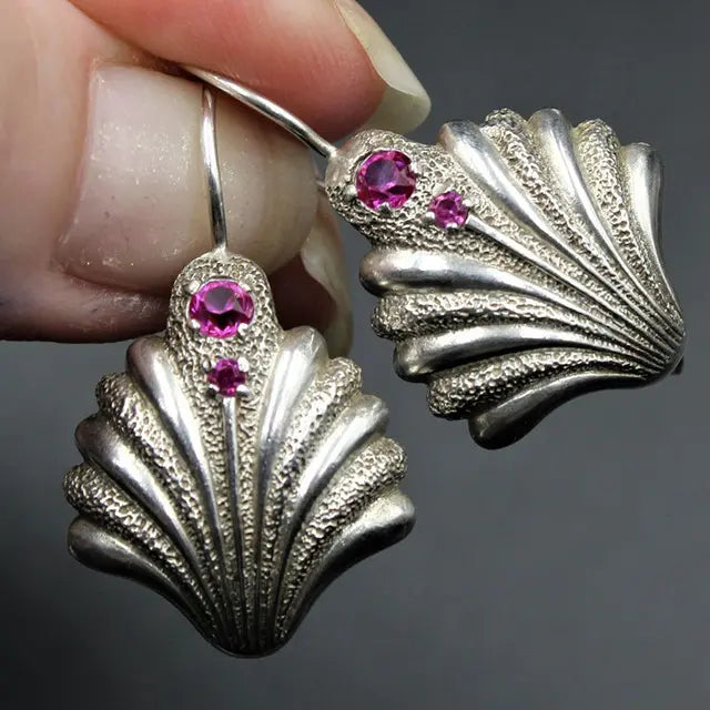 Vintage shell earrings with purple crystals Unique Joyas