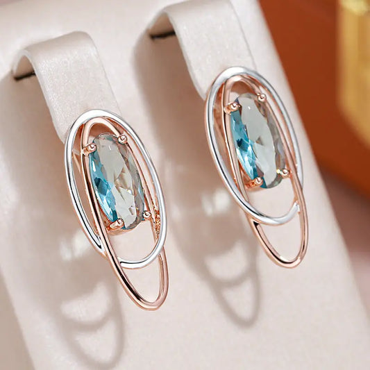 Elegant earrings with turquoise crystals in gold and silver