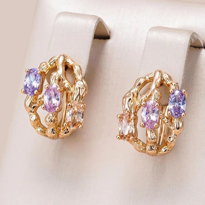 Exotic elegant earrings made of gold and multicolored stones Unique Joyas