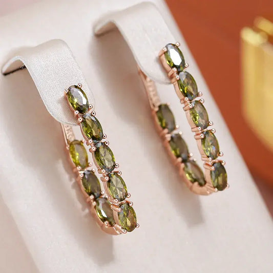 Elegant earrings with crystals in gold