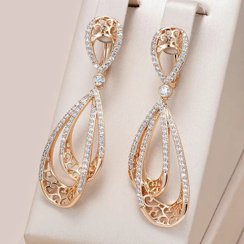 Elegant gold-shining earrings Unique Joyas