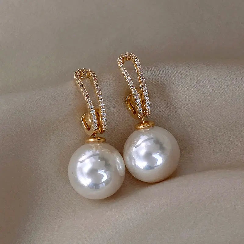 Elegant pearl earrings with zirconia Unique Joyas