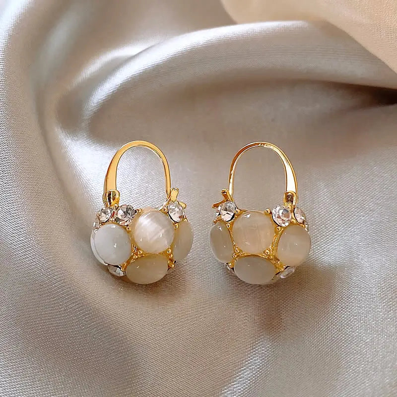 Pearl earrings with crystals in gold Unique Joyas