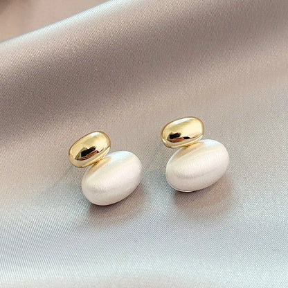 Oval Pearl Earrings in Gold