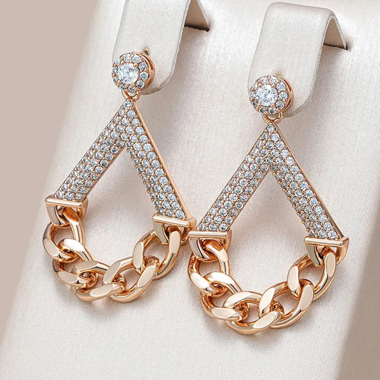 Elegant earrings with gold-shimmering chains