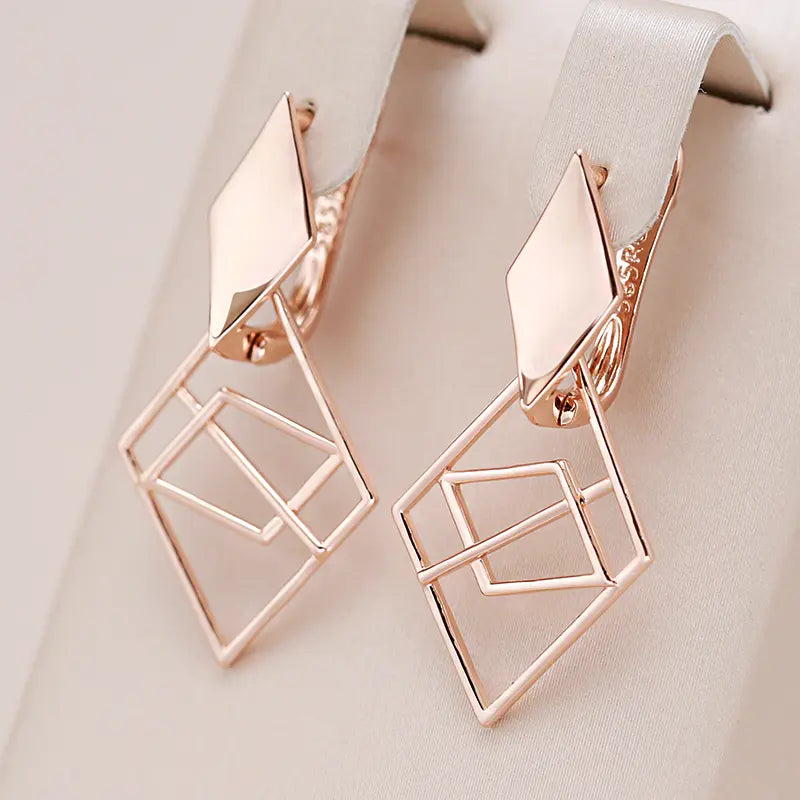 Elegant geometric gold earrings Unique Joyas