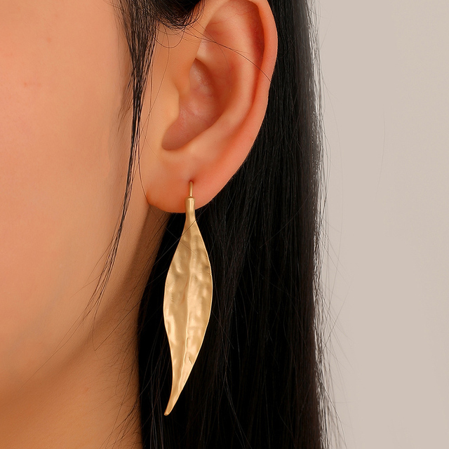 Vintage earrings with golden leaf