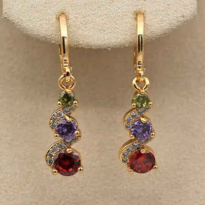 Elegant earrings with golden zirconia Unique Joyas