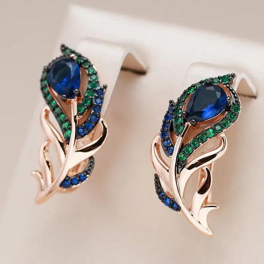 Elegant earrings with green and blue crystals