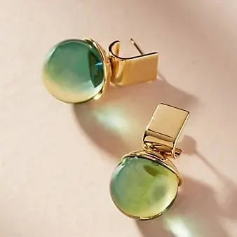 Vintage earrings with green crystal in gold Unique Joyas