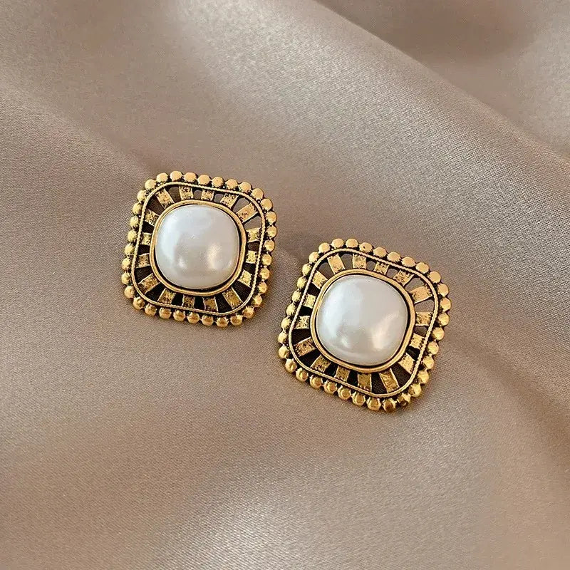 Gold-plated earrings with inlaid pearls Unique Joyas