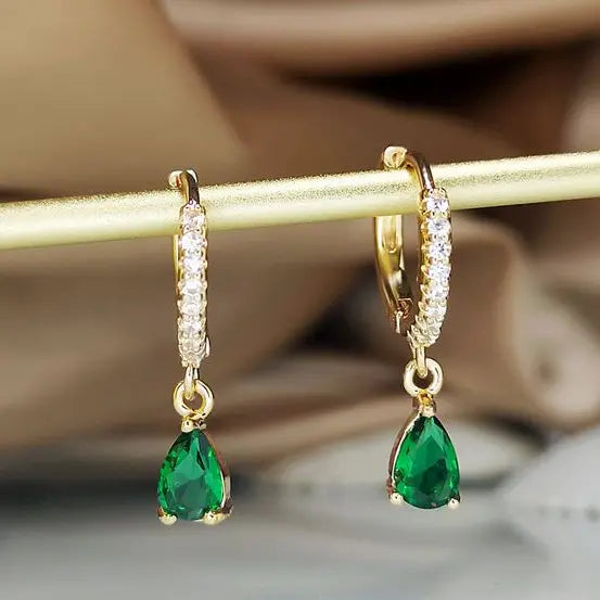 Earrings with dangling crystal in gold Unique Joyas