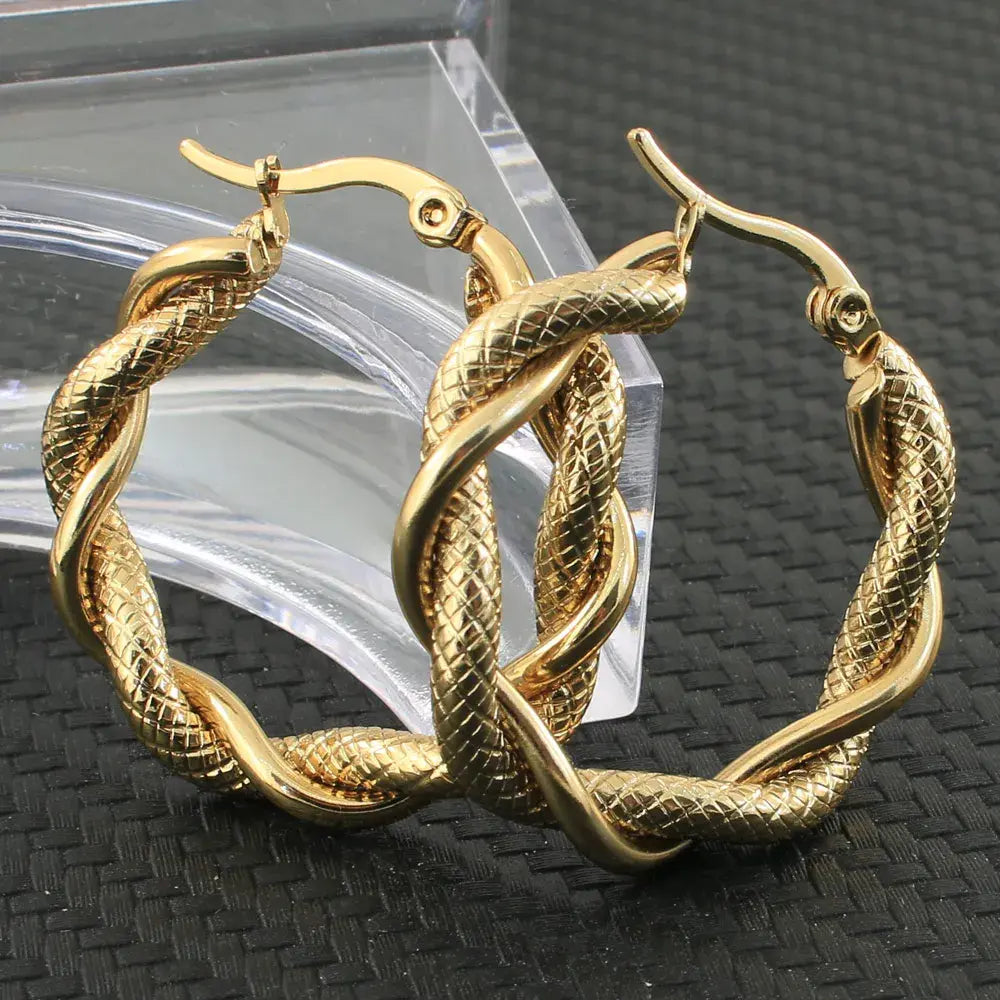 Golden braided earrings Unique Joyas