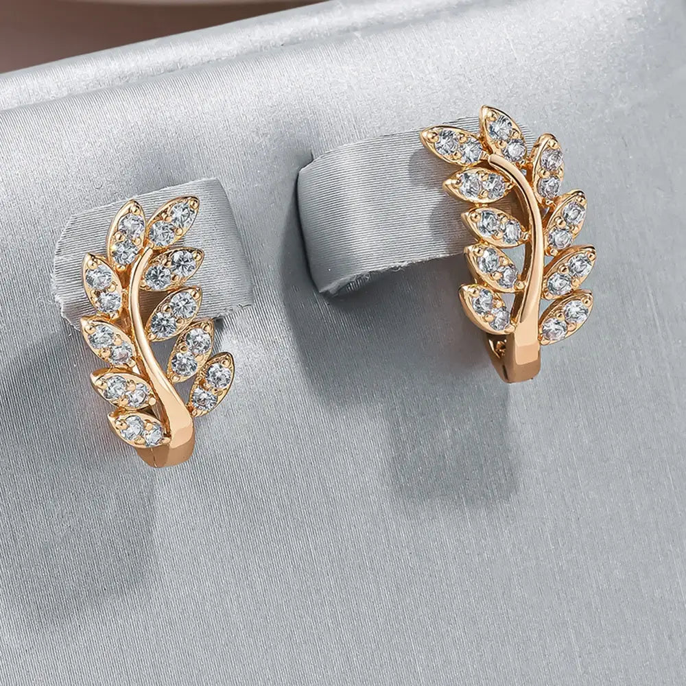 Elegant earrings with inlaid zirconia leaves Unique Joyas