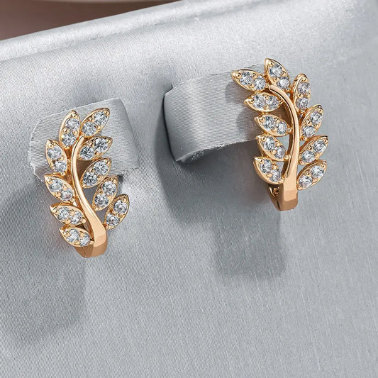 Elegant earrings with inlaid zirconia leaves