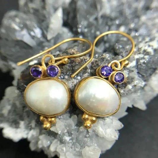 Vintage earrings with pearl and gold inlays Unique Joyas