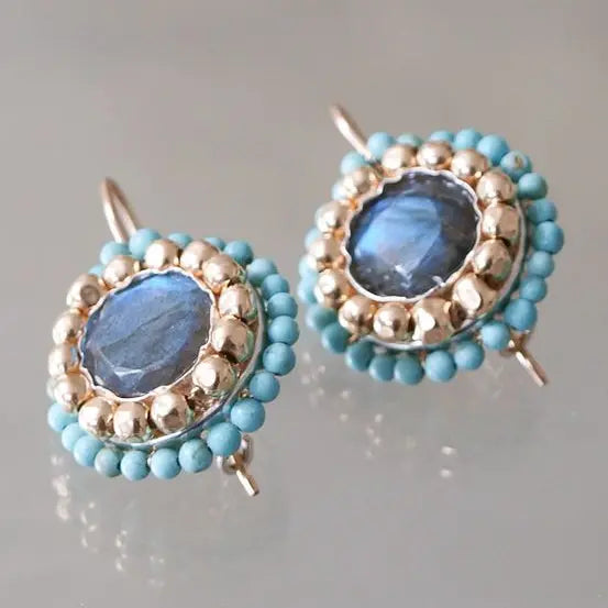 Vintage earrings with inlaid blue stones Unique Joyas