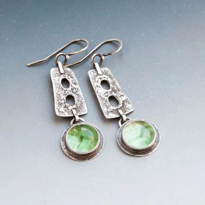 Boho earrings made of green crystal in silver