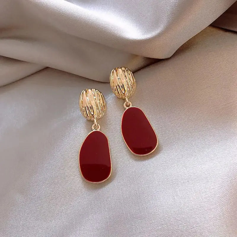 Elegant Earrings in Gold and Red