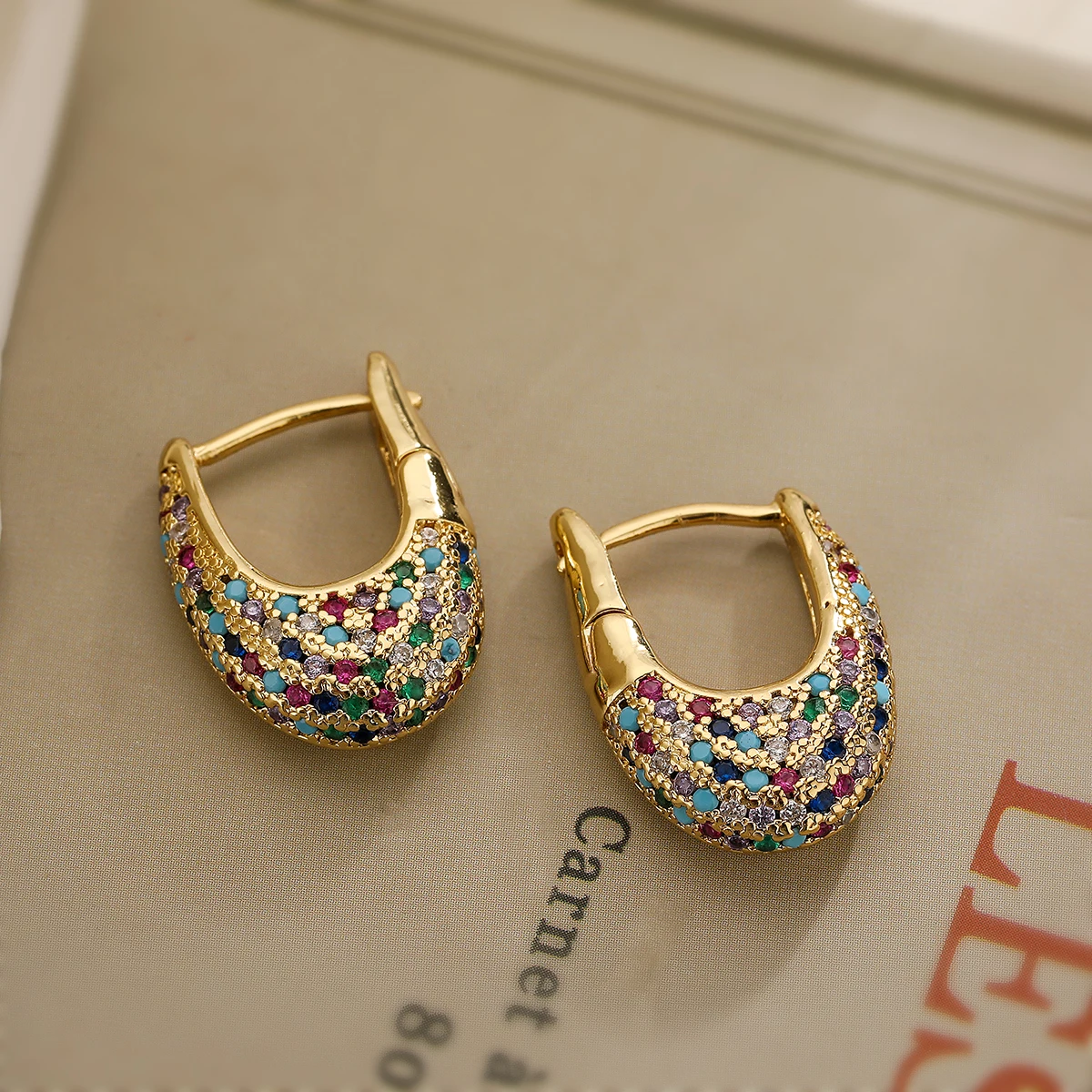 Elegant colorful earrings with inlaid crystals