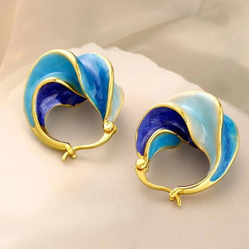 Vintage earrings made of blue enamel in gold