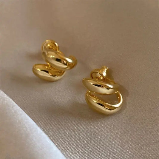 Elegant gold spiral earrings