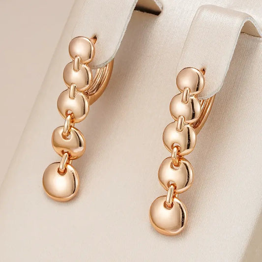 Elegant gold-plated dangling earrings Unique Joyas