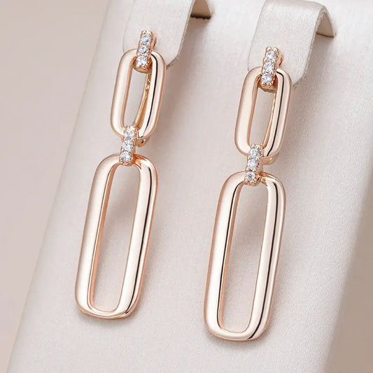 Hollow dangling earrings made of gold